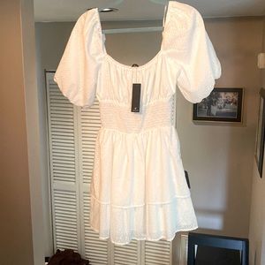 Lulu’s - size small. White dress with little floral detail. Mid-mini length